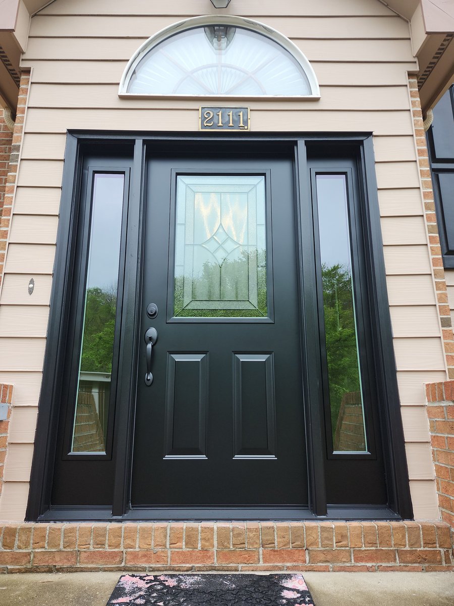 Front door with sidelights installed by Energy Swing Windows and Doors