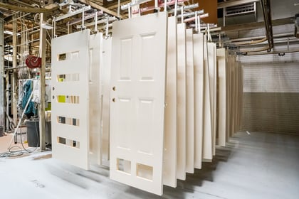ProVia factory entry doors hanging before being painted