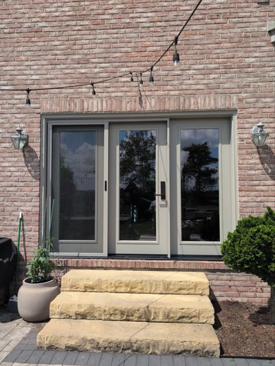 three panel hinged patio door tan