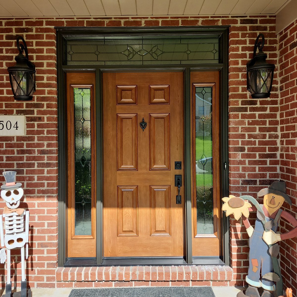 Fiberglass entry door with transom and sidelites