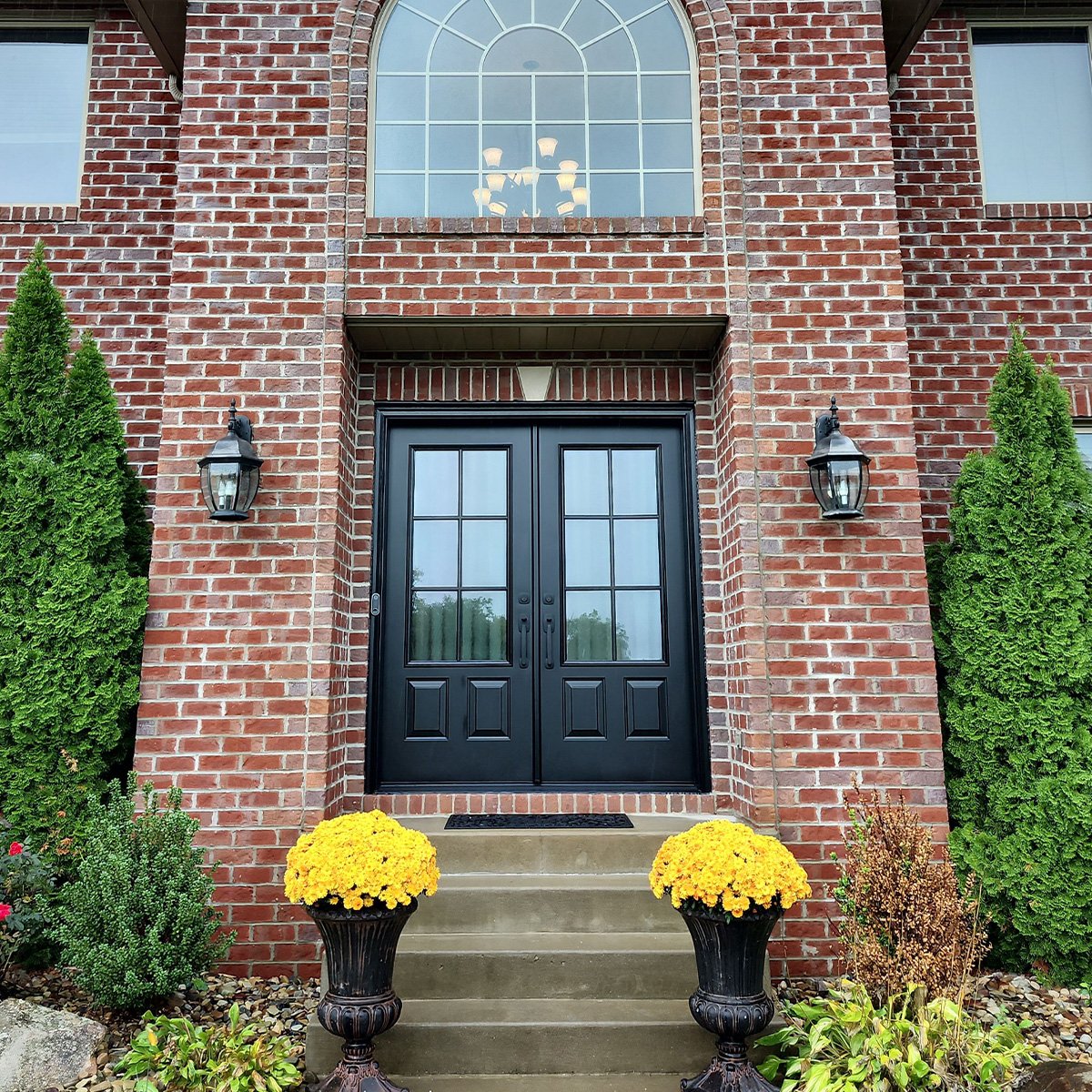 Double entry door black steel with decorative glass with grids