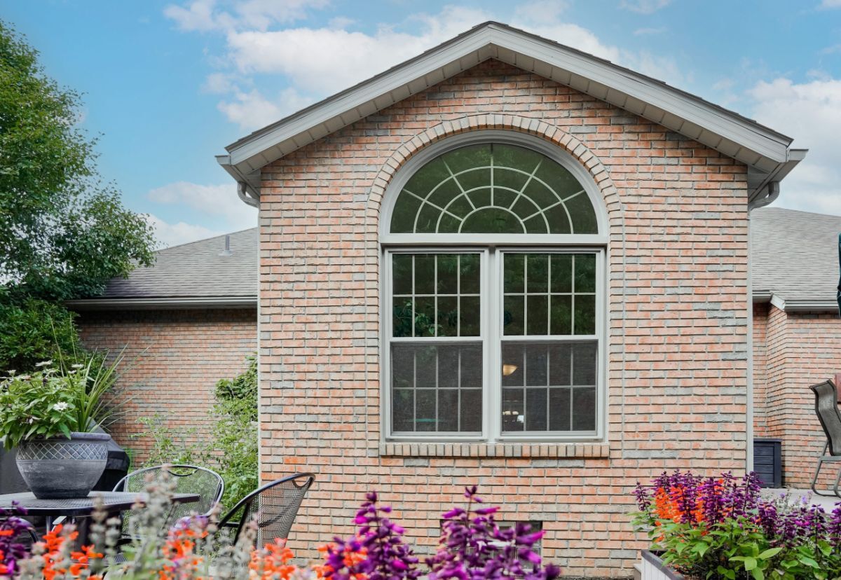 ProVia Aeris mulled double hung and shaped windows in Sandstone