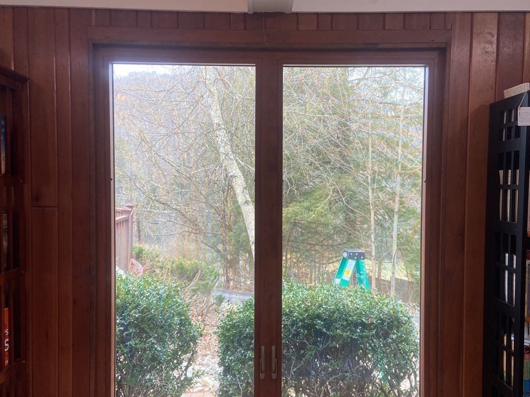 New ProVia window in a cherry-paneled room in Ligonier, PA