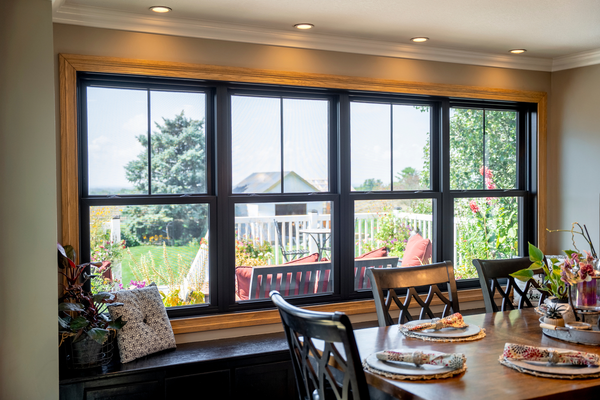 ProVia Endure mulled double hung windows in Textured Matte Coal Black with internal grids