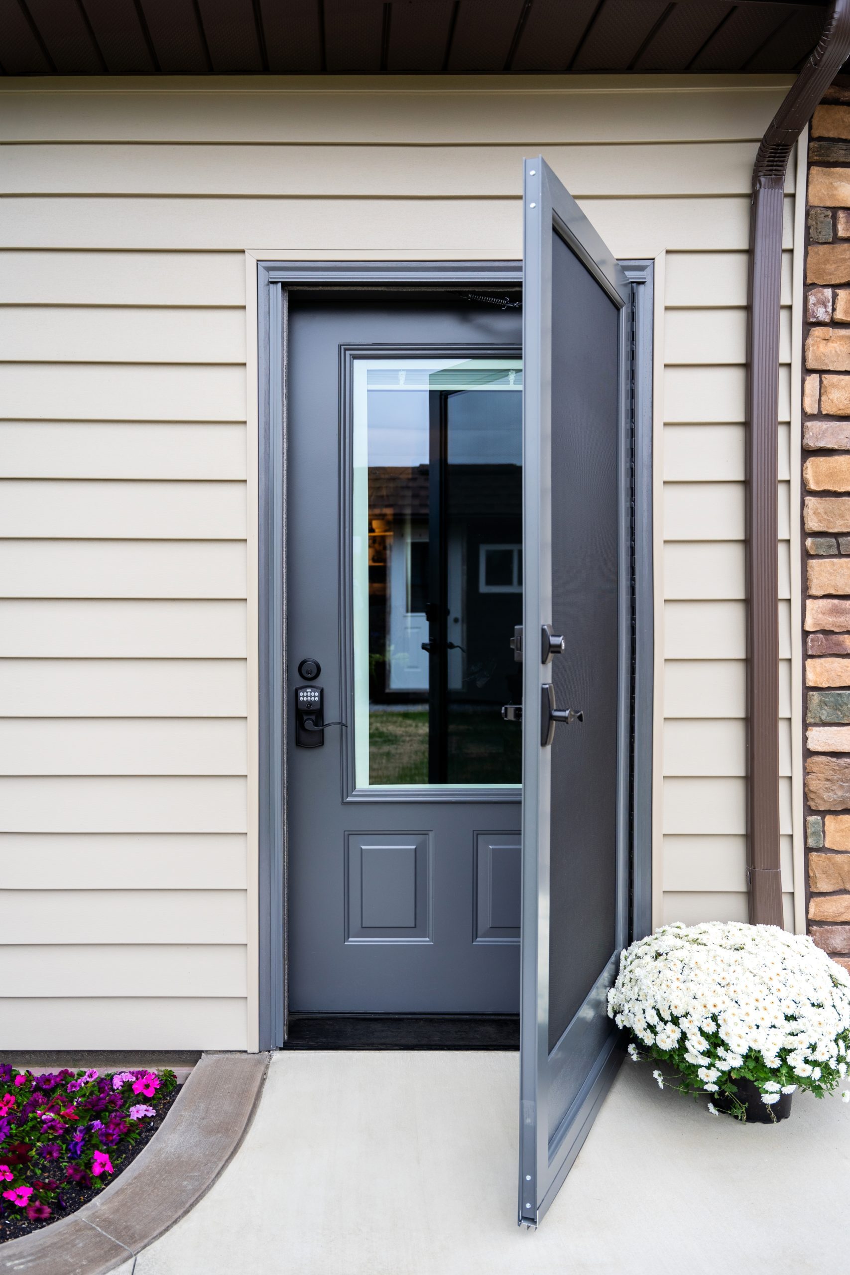 ProVia Legacy steel entry door with a matching storm door