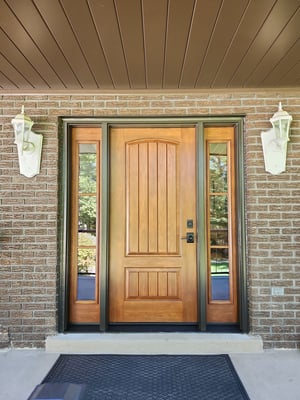 Solid Entry Door with Two Decorative Sidelites Image