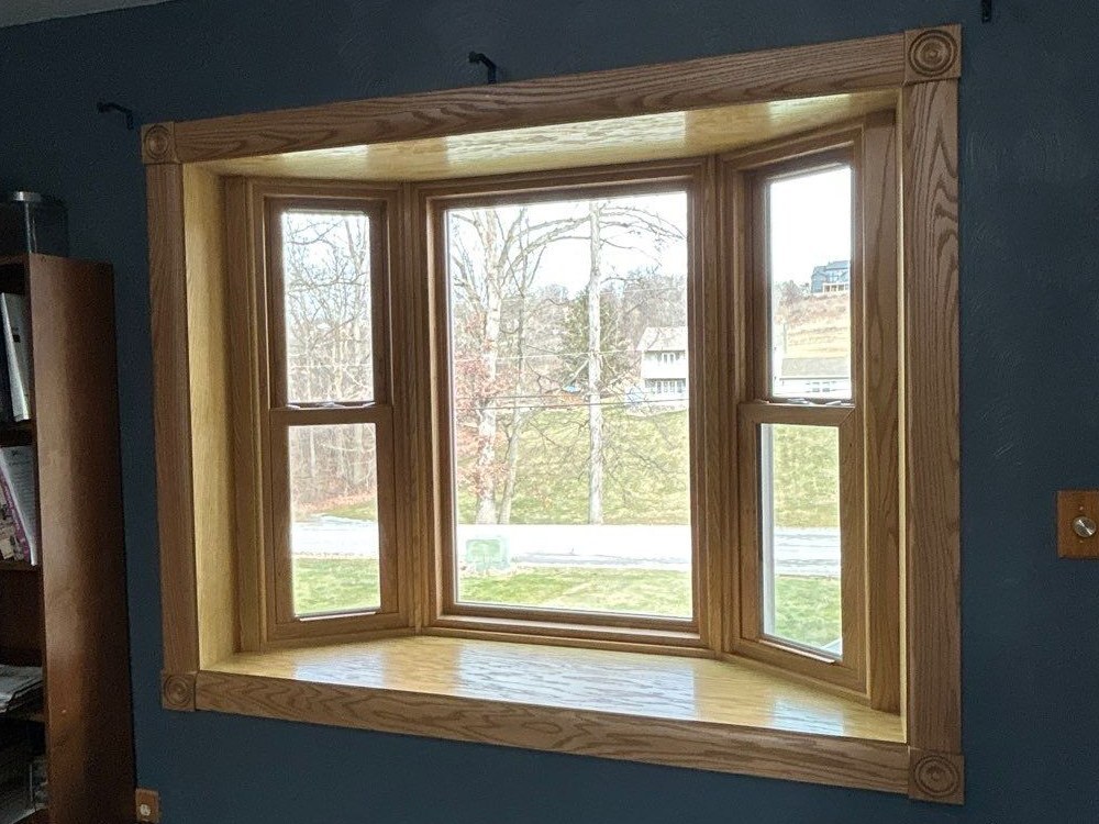 ProVia bay window with a woodgrain interior, installed by Energy Swing