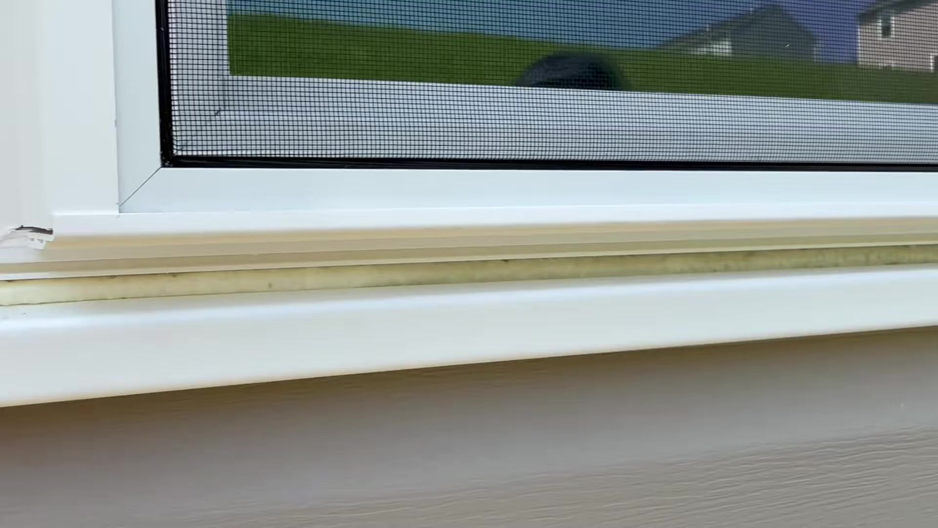 Close-up of integrated J-channel over the sealant on a finished Energy Swing install