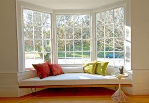 bay windows overlooking backyard