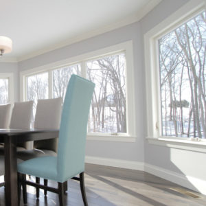 naturally lit dining room with big windows